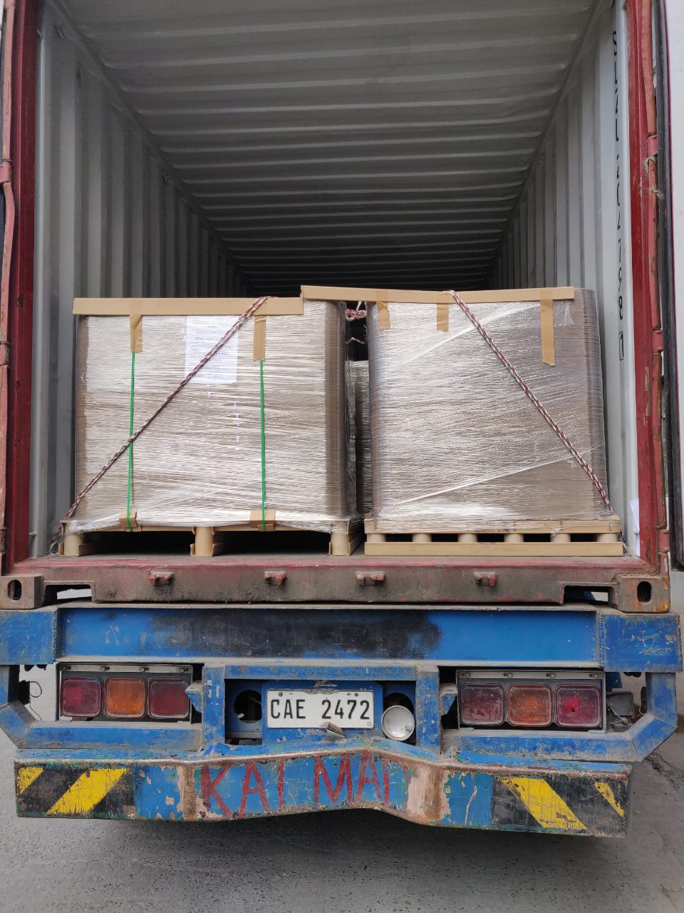 Container loading of palletised fibre board